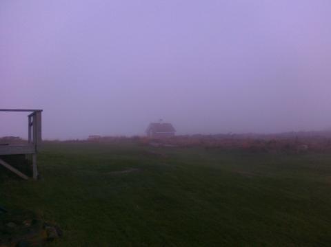 Oil house through haze