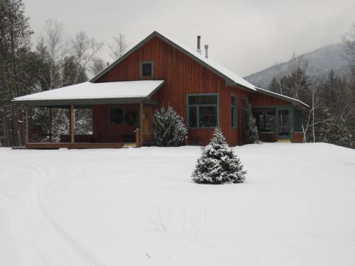 Our house surrounded by snow